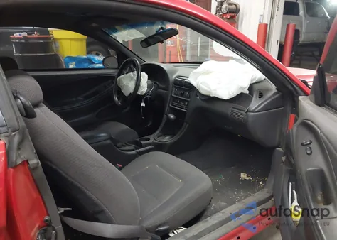 1999 Ford Mustang z USA, uszkodzony, nr VIN 1FAFP4047XF131276